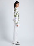 Side image of model wearing Stripe Murphy Sweater in Cotton Cashmere in CHALK/WILLOW
