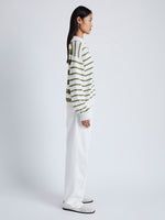 Side image of model wearing Stripe Murphy Sweater in Cotton Cashmere in CHALK/WILLOW