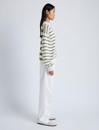 Side image of model wearing Stripe Murphy Sweater in Cotton Cashmere in CHALK/WILLOW