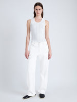 Front full length image of model wearing Perry Knit Top in Compact Pointelle Rib in OFF WHITE