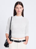 Cropped front image of model wearing Nicola Sweater in Zig Zag Pointelle in OFF WHITE