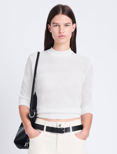Cropped front image of model wearing Nicola Sweater in Zig Zag Pointelle in OFF WHITE