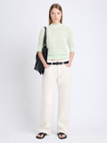 Front full length image of model wearing Nicola Sweater in Zig Zag Pointelle in PISTACHIO