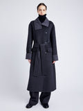 Proenza Schouler Front full length image of model wearing Constance Coat in Pinstripe Wool Cashmere in DARK GREY MELANGE buttoned with coat belt