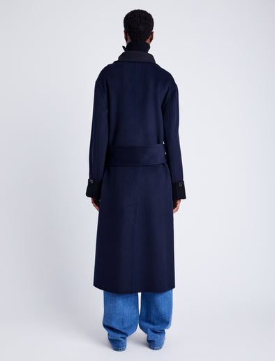 Proenza Schouler Back full length image of model wearing Constance Coat in Pinstripe Wool Cashmere in NAVY MELANGE