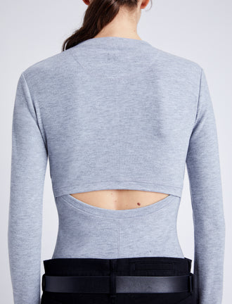 Proenza Schouler Detail image of model wearing Delaney Bodysuit in Brushed Rib in ICE