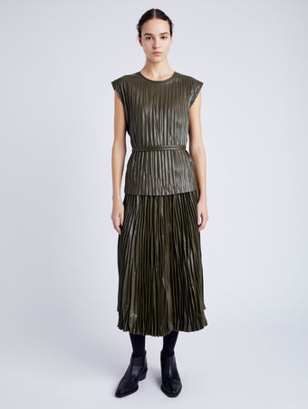 Proenza Schouler Front full length image of model wearing Lyra Pleated Top in Lightweight Faux Leather in DARK FERN