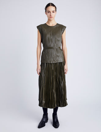 Proenza Schouler Front full length image of model wearing Lyra Pleated Top in Lightweight Faux Leather in DARK FERN