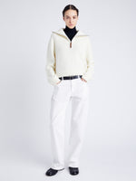 Proenza Schouler Front full length image of model wearing Sienna Knit Sweater in Wool Blend in OFF WHITE with zip halfway down