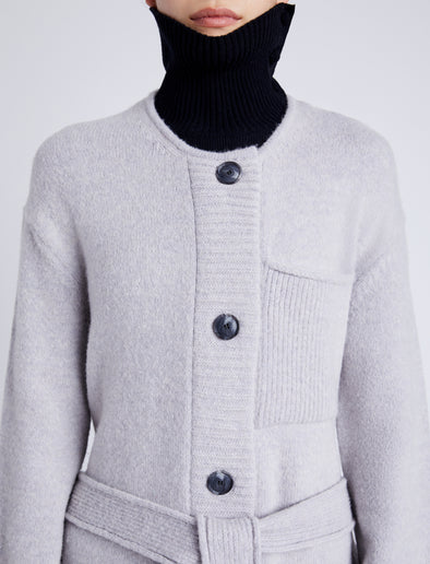 Proenza Schouler Detail image of model wearing Lenora Knit Cardigan in Wool Blend in LIGHT GREY