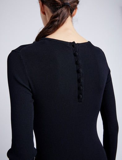Proenza Schouler Detail image of model wearing Elie Knit Dress in Viscose Rib in BLACK