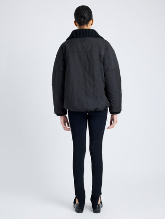 Proenza Schouler Back full length image of model wearing Veronica Coat in Parachute Cotton in BLACK