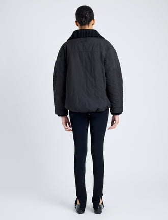 Proenza Schouler Back full length image of model wearing Veronica Coat in Parachute Cotton in BLACK