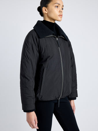 Proenza Schouler Detail image of model wearing Veronica Coat in Parachute Cotton in BLACK