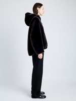Proenza Schouler side full length image of model wearing Dakota Coat in Shearling in CACAO
