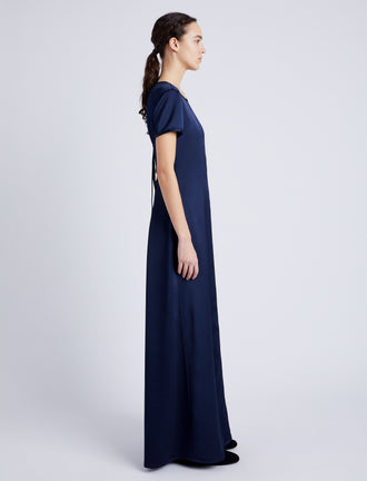 Proenza Schouler side image of model wearing Delphine Dress in Satin in INK