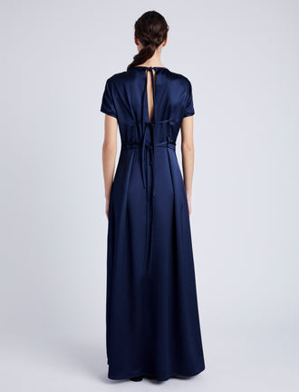 Proenza Schouler back image of model wearing Delphine Dress in Satin in INK