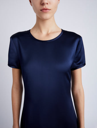 Proenza Schouler detail image of model wearing Delphine Dress in Satin in INK