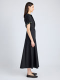 Proenza Schouler Side full length image of model wearing Elizabeth Dress in Parachute Cotton in BLACK