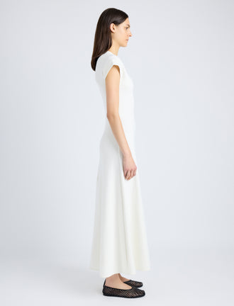 Proenza Schouler Side full length image of model wearing Melanie Dress in Souffle Cotton Blend in ALABASTER