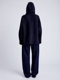 Proenza Schouler Back full length image of model wearing Isaac Hoodie in Double Face Wool in INK/BLACK