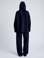 Proenza Schouler Back full length image of model wearing Isaac Hoodie in Double Face Wool in INK/BLACK