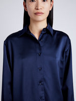 Proenza Schouler Detail image of model wearing Raven Shirt in Satin in INK