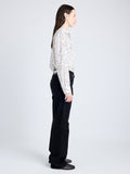 Proenza Schouler Side full length image of model wearing Eve Top in Printed Parachute Flou in ALABASTER MULTI