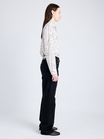Proenza Schouler Side full length image of model wearing Eve Top in Printed Parachute Flou in ALABASTER MULTI