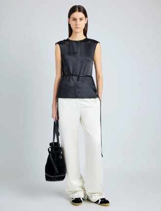 Proenza Schouler Front full length image of model wearing Clemence Top in Satin in BLACK