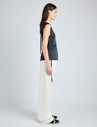 Proenza Schouler Side full length image of model wearing Clemence Top in Satin in BLACK