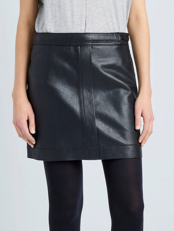 Proenza Schouler detail image of model wearing Blaze Skirt in Pebbled Leather in black