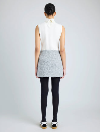 Proenza Schouler back image of model wearing Elise Skirt in Boucle in COAL/BLACK/ALABASTER