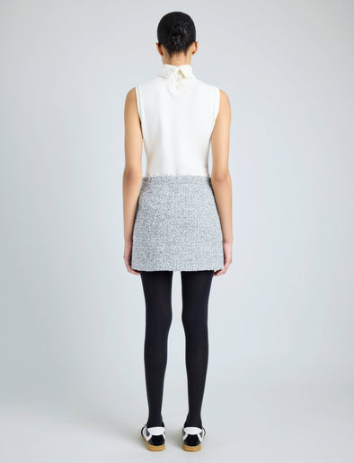 Proenza Schouler back image of model wearing Elise Skirt in Boucle in COAL/BLACK/ALABASTER