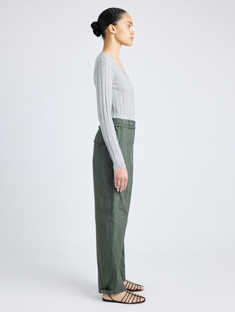 Proenza Schouler Side full length image of model wearing Nicole Pant in Parachute Cotton in DARK SPRUCE