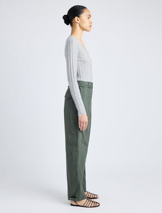 Proenza Schouler Side full length image of model wearing Nicole Pant in Parachute Cotton in DARK SPRUCE