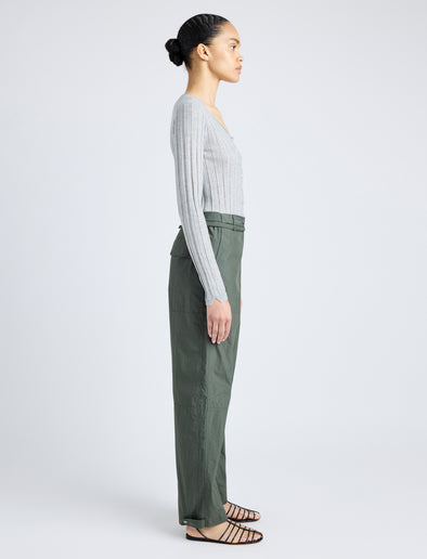Proenza Schouler Side full length image of model wearing Nicole Pant in Parachute Cotton in DARK SPRUCE