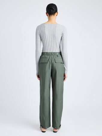 Proenza Schouler Back full length image of model wearing Nicole Pant in Parachute Cotton in DARK SPRUCE