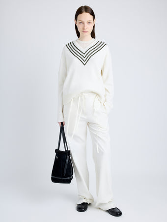 Proenza Schouler Front full length image of model wearing Gianna Top in Merino Stripe in OFF WHITE