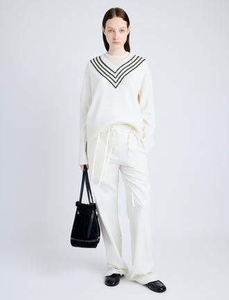 Proenza Schouler Front full length image of model wearing Gianna Top in Merino Stripe in OFF WHITE