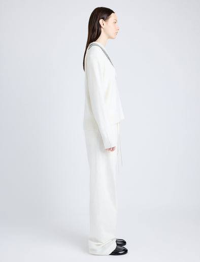 Proenza Schouler Side full length image of model wearing Gianna Top in Merino Stripe in OFF WHITE