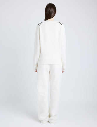 Proenza Schouler Back full length image of model wearing Gianna Top in Merino Stripe in OFF WHITE