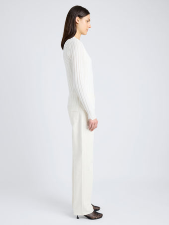 Proenza Schouler Side full length image of model wearing Hattie Cardigan in Lightweight Cashmere in IVORY
