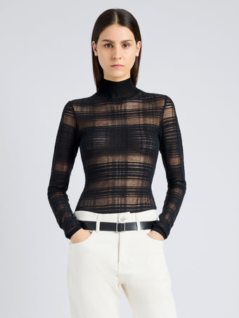 Proenza Schouler Front cropped image of model wearing Stefanie Sweater in Plaid Knits in BLACK