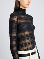 Proenza Schouler Detail image of model wearing Stefanie Sweater in Plaid Knits in BLACK