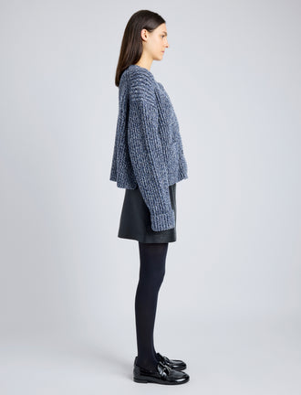 Proenza Schouler Side full length image of model wearing Azura Sweater in Moulinex Knits in INK MELANGE