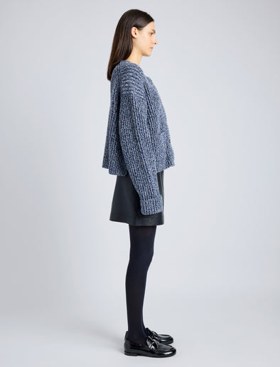 Proenza Schouler Side full length image of model wearing Azura Sweater in Moulinex Knits in INK MELANGE