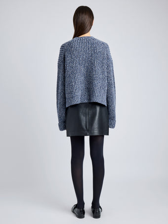 Proenza Schouler Back full length image of model wearing Azura Sweater in Moulinex Knits in INK MELANGE