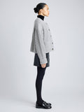 Proenza Schouler Side full length image of model wearing Azura Sweater in Moulinex Knits in PEBBLE MELANGE
