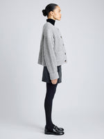 Proenza Schouler Side full length image of model wearing Azura Sweater in Moulinex Knits in PEBBLE MELANGE
